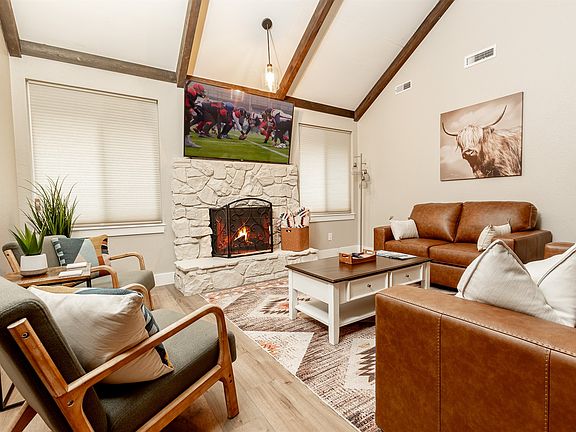 Lots of room for everyone to have a seat and enjoy the 70 inch TV