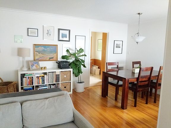 View from Living Room into Dining Area, showing side door in