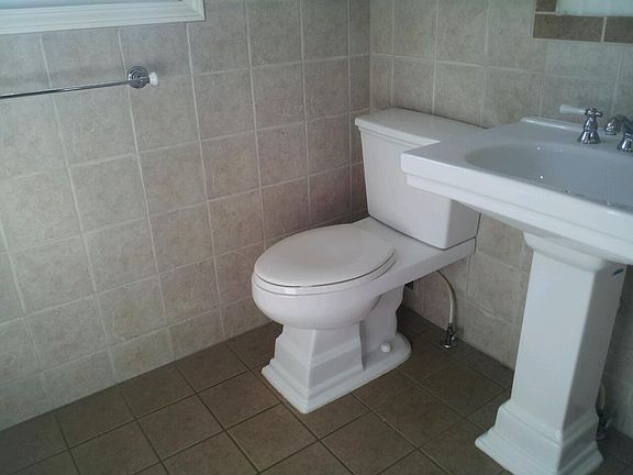 New vanity w/sink installed (picture has not been updated yet, but this shows general look of bathroom)