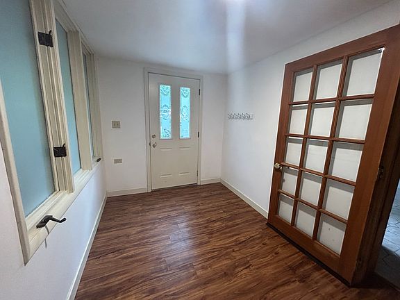 Foyer with storage closet