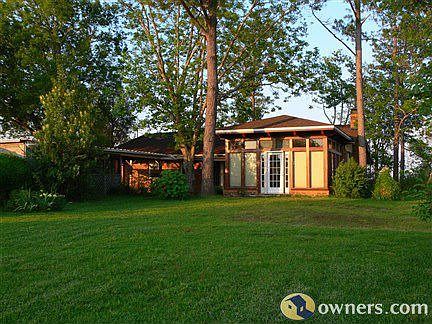 Backyard looking at sunroom