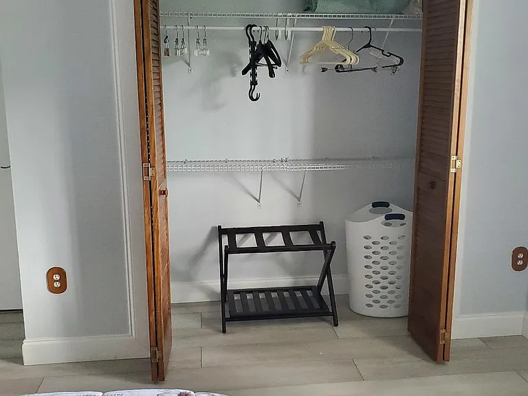 Bedroom 2 - Closet extends on both sides and is full length of wall