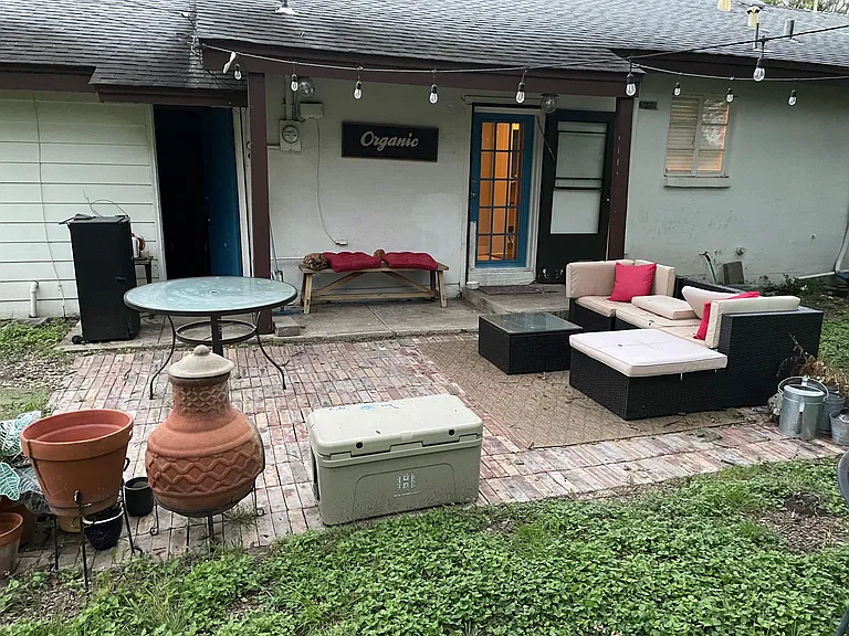 Brick patio under huge tree