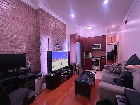5th image of 410 W 51st St APT 103