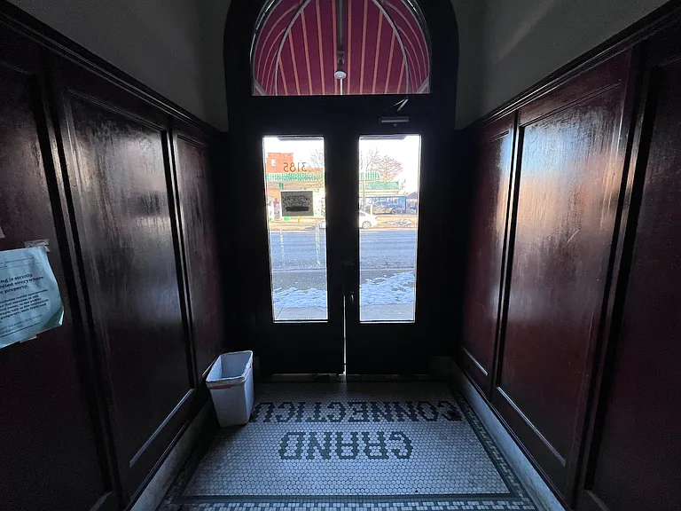Main double doors of the lobby looking out onto S. Grand.