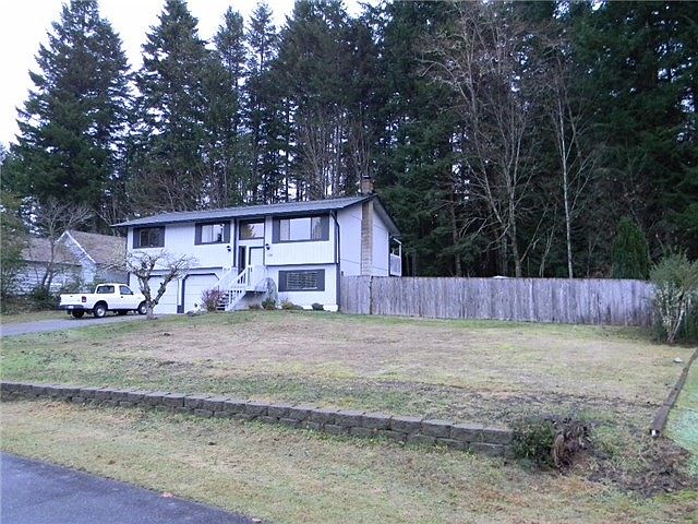 1st image of 100 NE Riverhill Dr