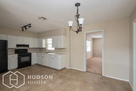 Hudson Homes Management - Dining Area and Kitchen