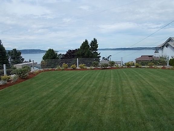 Plenty of parking 3 garages with workshop. Also you can park your RV, Boat or whatever other toys you have!