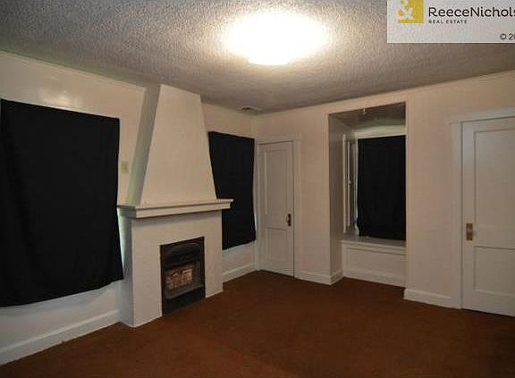 Master Bedroom with fireplace and double closets