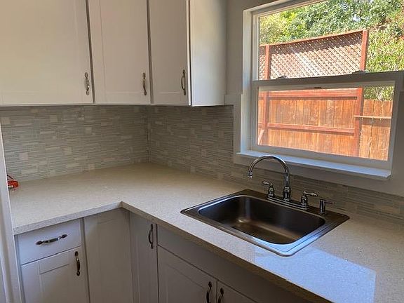 KITCHEN WITH CABINETS AND SINK