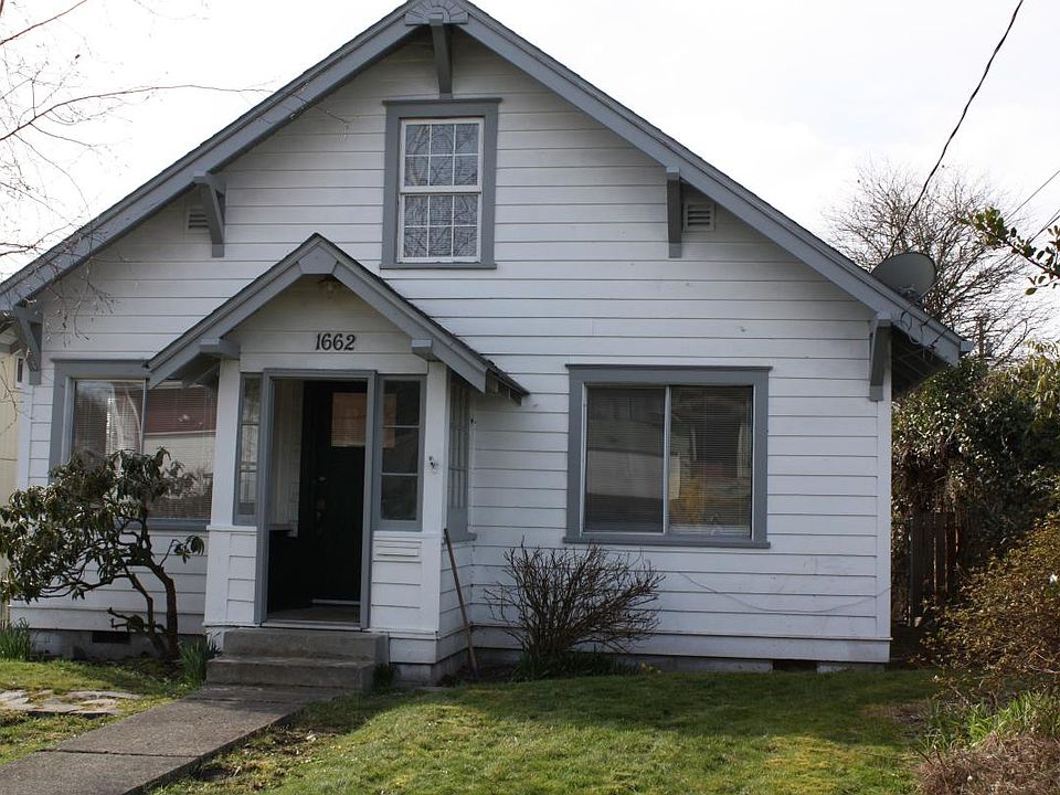 Front of fully fenced home (garage in back)