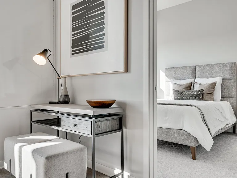 A sleek workspace meets cozy comfort, just steps from your bedroom retreat.