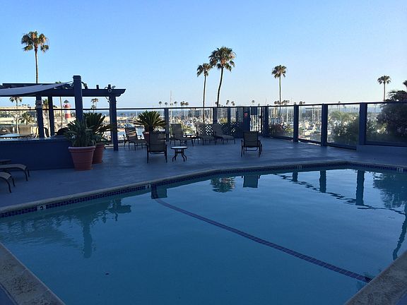 Pool Area with hot tub, sitting area and grill