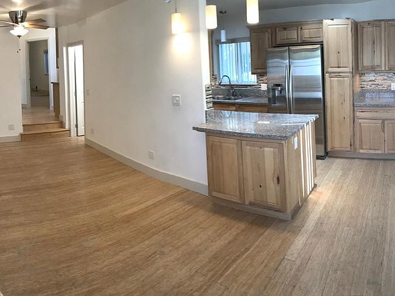 Under counter storage. Bamboo strand hardwood flooring.