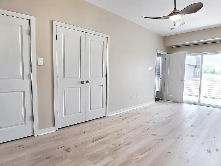Owner's suite with private access to balcony. Two separate entrances to large closet.
