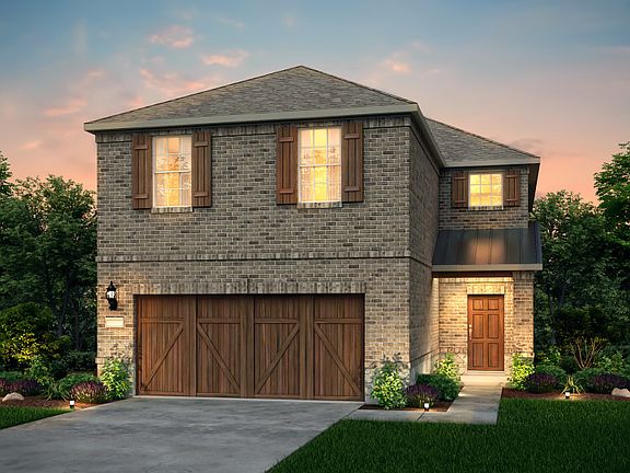 The Rybrook, a two-story home with 2-car garage, shown with Home Exterior M