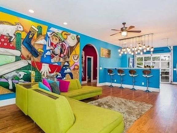 Large open living with 10' maybe bar.