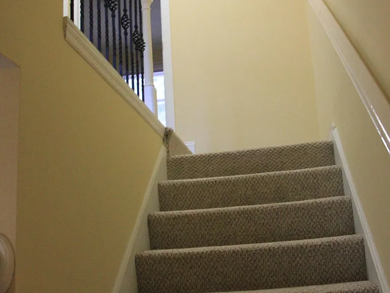 Stairs up to 2 bedrooms