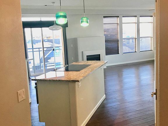 Entrance into loft - sliding door opens to extra large balcony_