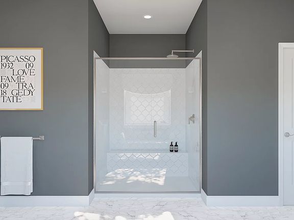 Primary bath with glass shower enclosure