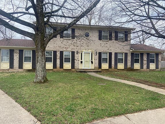 Front of property. Right side is vacant.