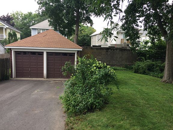 Backyard. Driveway parking.