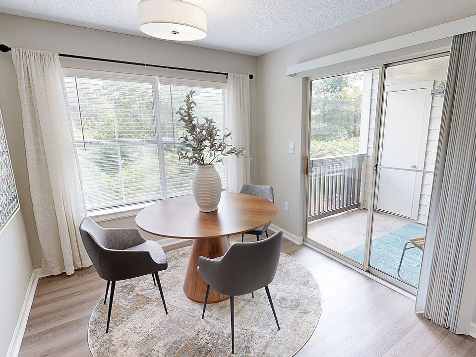 Open and airy dining room with private balcony or terrace