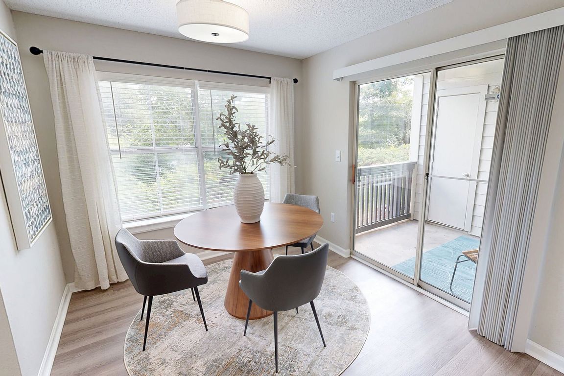 Open and airy dining room with private balcony or terrace