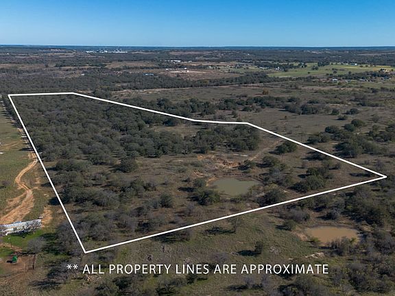 Acreage For Sale with a pond and water wells in Jack County | Owner Finance Available