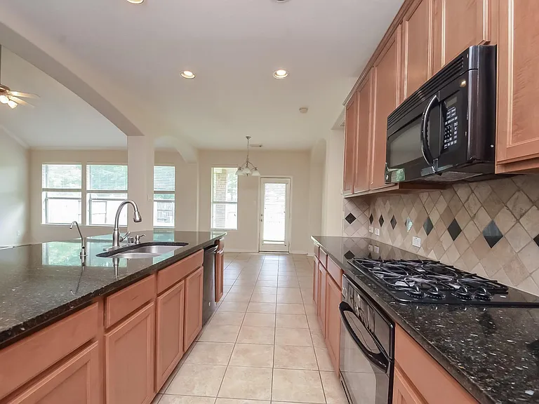 5218 Lacey Oak Meadow Dr — Photo 14