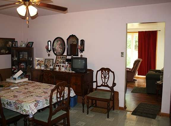 Dining area just next to the eat in kitchen, bar seating also.