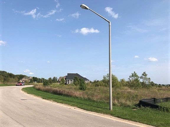Street View facing Easterly, level to slight increase in grade from curb to garage floor elevation a