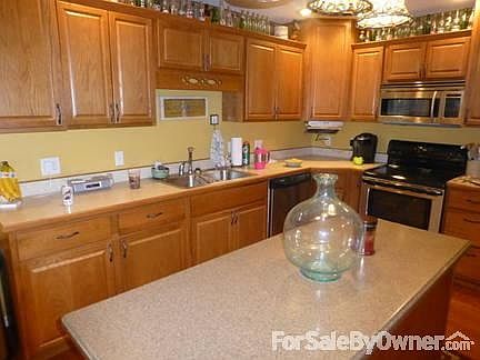 Living room.
						:
						Recently remodeled, wood burning fireplace, new carpet throughout the house.