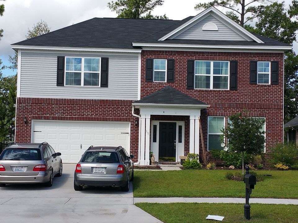 Front of the Home - Brick and Vinyl