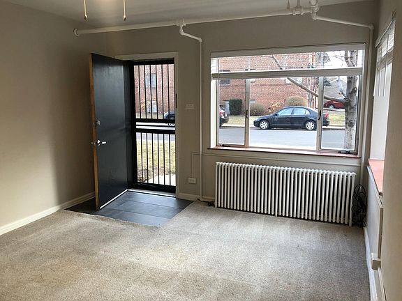 Your private entrance. View of mature trees and lawn. New luxury vinyl flooring with a wood look. (Picture coming)