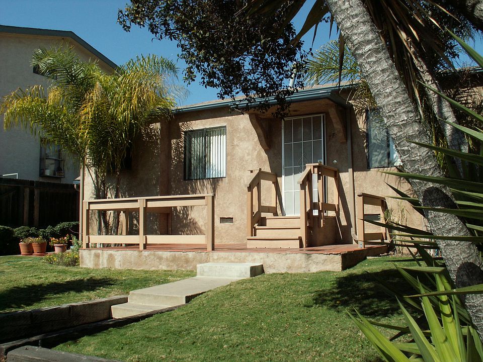 Front of Property, Unit number 4 is in the back building up the stairs.