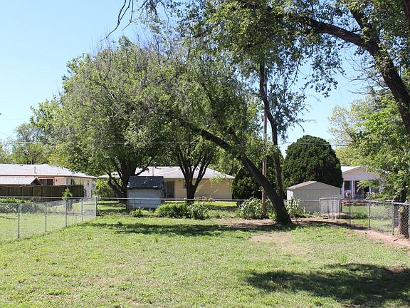 Oversized Private Fenced Yard with Concrete Patio-Mowing Inc
