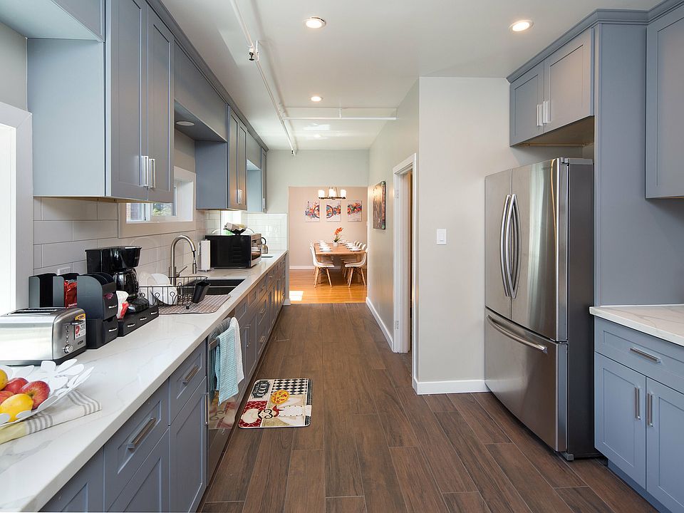Renovated kitchen featuring sleek appliances