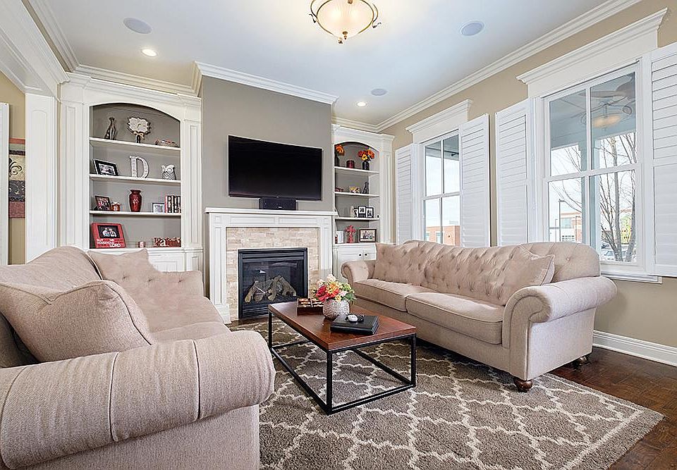 Stunning Living Room with friplace, built in bookcases and l