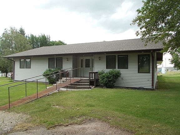 Main entrance faces west. 