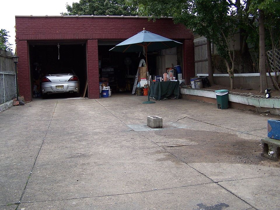 Yard with 2 detached garages