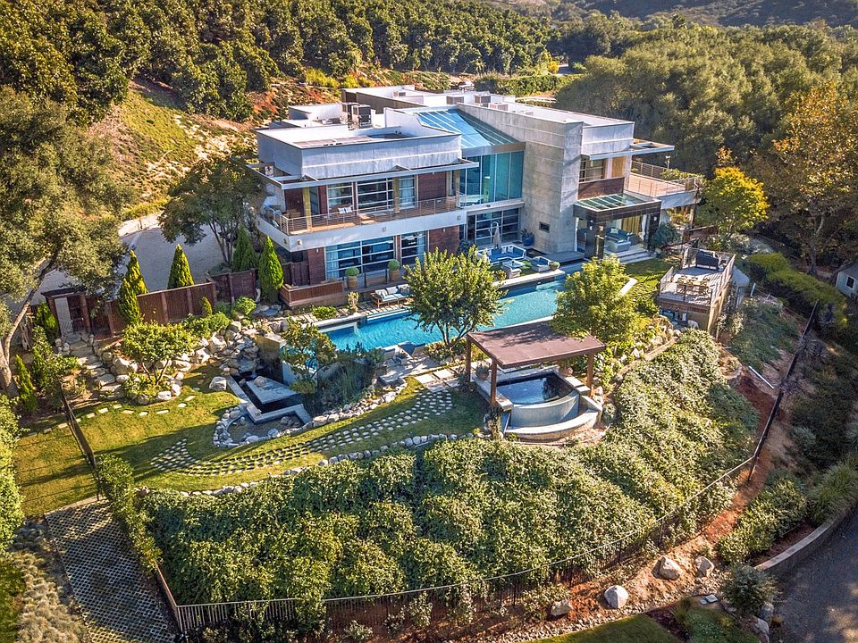 Aerial view of home 10,000 sq ft and 15 acres of property
