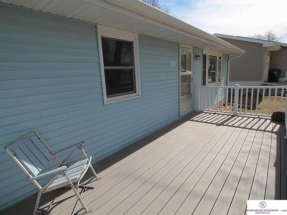 NO MAINTENANCE TREX DECK WITH VINYL RAILINGS. VINYL SIDING AND NEWER ROOF AND GUTTERS IN 2015