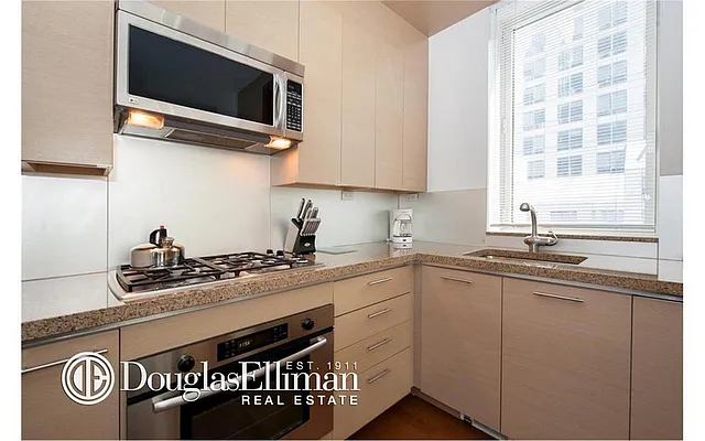 Sold by Douglas Elliman | media 13