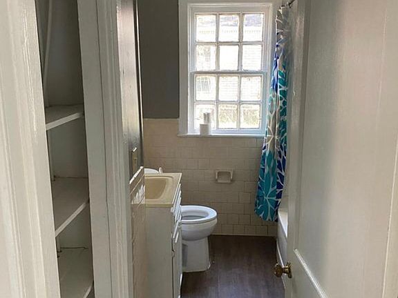 bathroom with tub shower combination