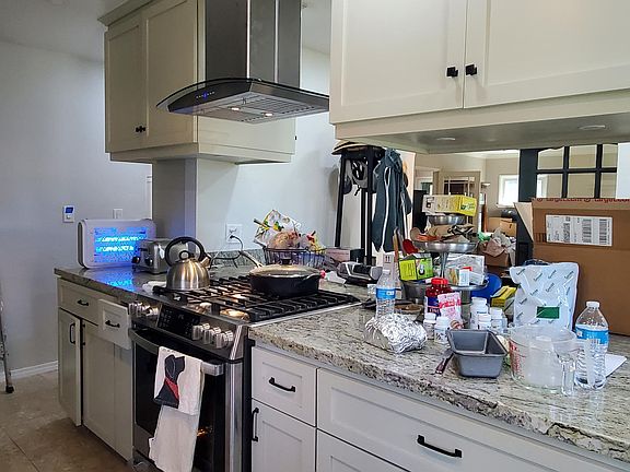 Kitchen looking into living room