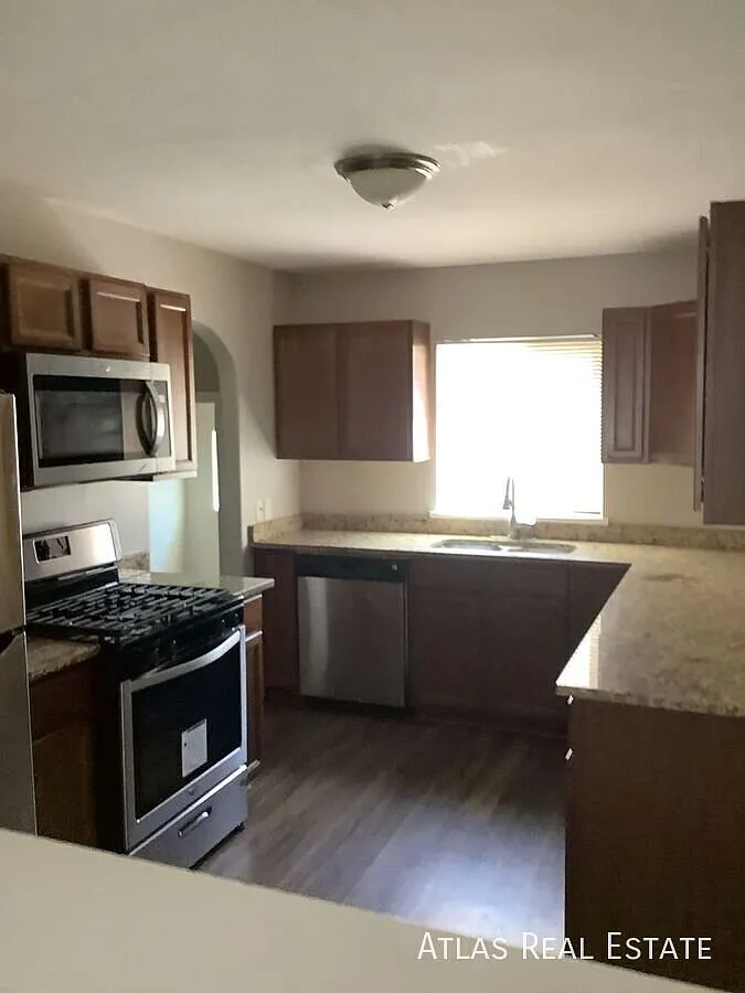 Charming 4bd/2ba Aurora Home with Covered Patio & Detached Garage — Photo 4