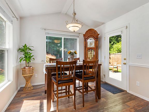 Door from Dining opens up to patio/yard.