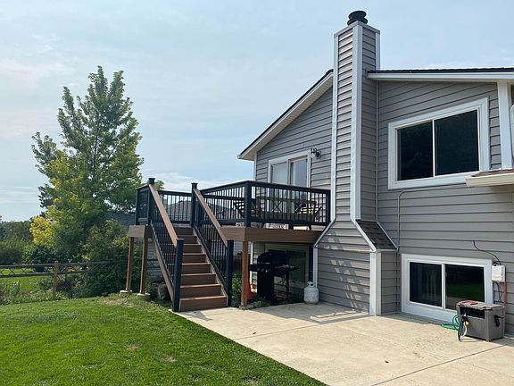 Deck from kitchen leading to patio