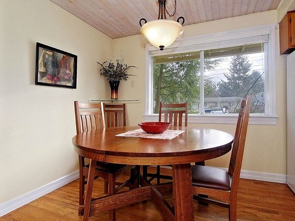 Eating area off Kitchen.  Hardwood floors.